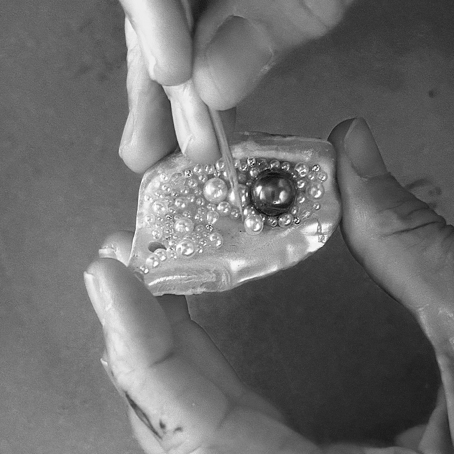 Inspiration de pendentif coquillage orné de petites perles